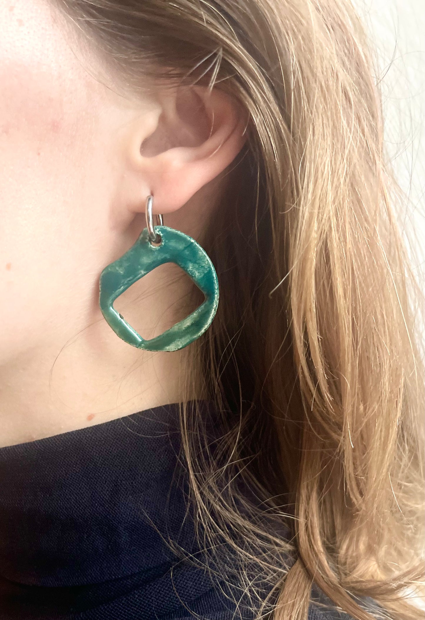 Earrings in dark green